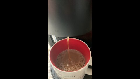 Keurig coffee cup being filled