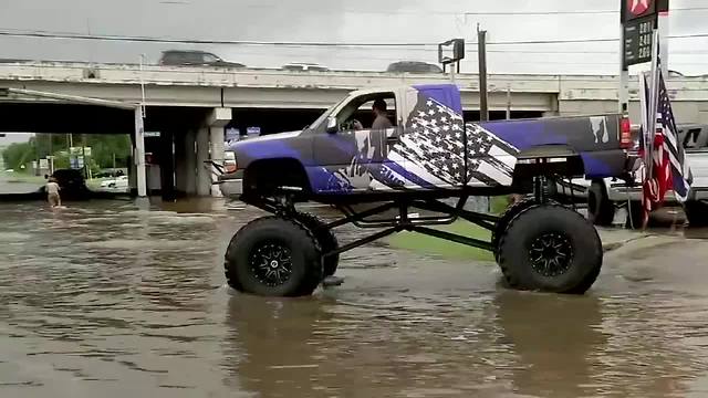 A Houston man used a Monster truck to help him navigate flood waters and rescue stranded drivers.