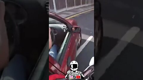 MOTORBIKE CRASHES INTO CAR