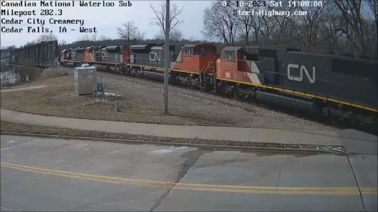 SD60 Leading WB L571 Manifest at Cedar Falls and Iowa Falls, IA on February 18, 2023