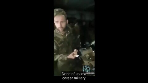 Ukrainian POWs from near Popasnaya are fed and given cigarettes