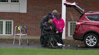 Family & friends welcome home father who had emergency heart surgery