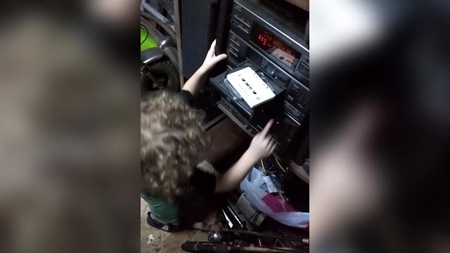 "Toddler Gets Confused By CD Player"