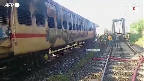 Train fire in India kills 23 and injures dozens. Rescue footage #shorts #trainfire