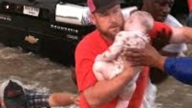 MAN SAVES DYING BABY FROM TRUCK IN TEXAS FLOODING!!