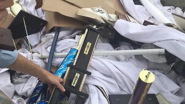 Marching Band Trophies Thrown Into Dumpster