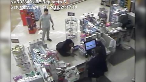 VIDEO: Woman pulls off armed robbery at Cleveland Rite Aid, police looking for suspect