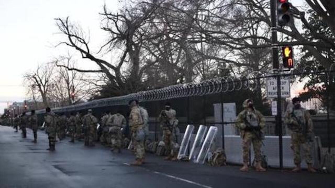 U.S. Soldiers and Airmen with the National Guard provide security