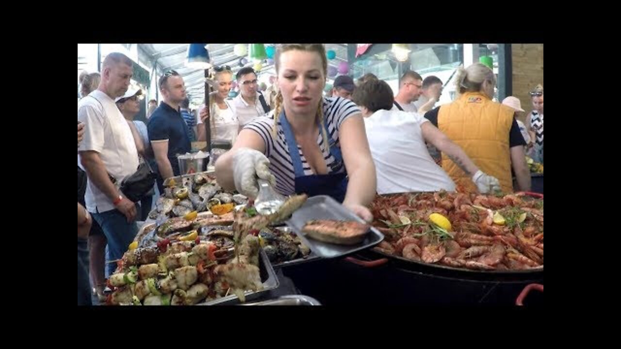 Huge Pans Cooking Huge Doses of Fish. Kiev Street