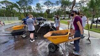 Volunteers honor memory of late student in Jupiter