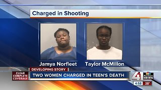 Two women charged in teen's death outside school