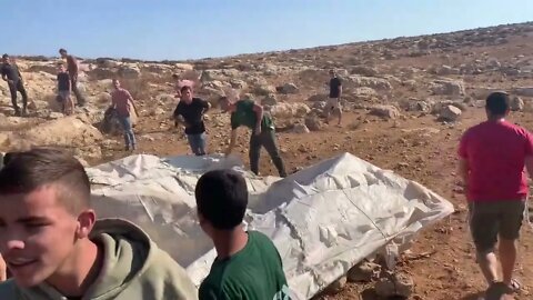 Settlers and the Israeli military raid Masafer Yatta