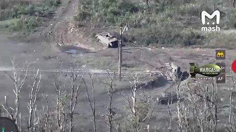 Drone records burning Ukrainian armor and other wrecked equipment