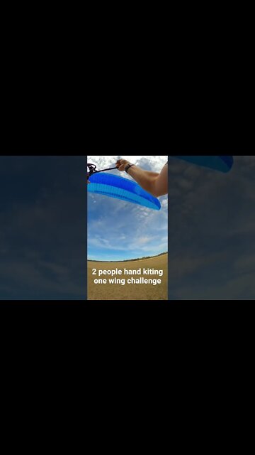 2 people hand kiting 1 wing challenge