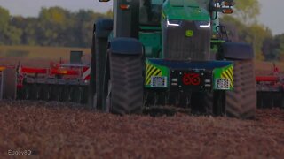 John Deere 8RX 410 with Kuhn Cultivator