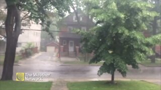 Watching as the street gets blasted with rain