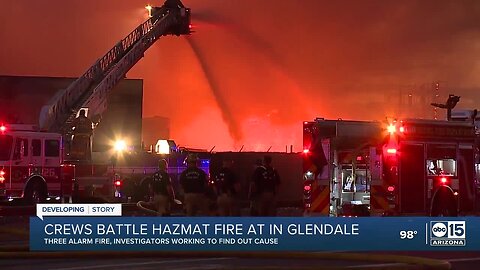 Crews continue to monitor scene of third-alarm fire at recycling yard