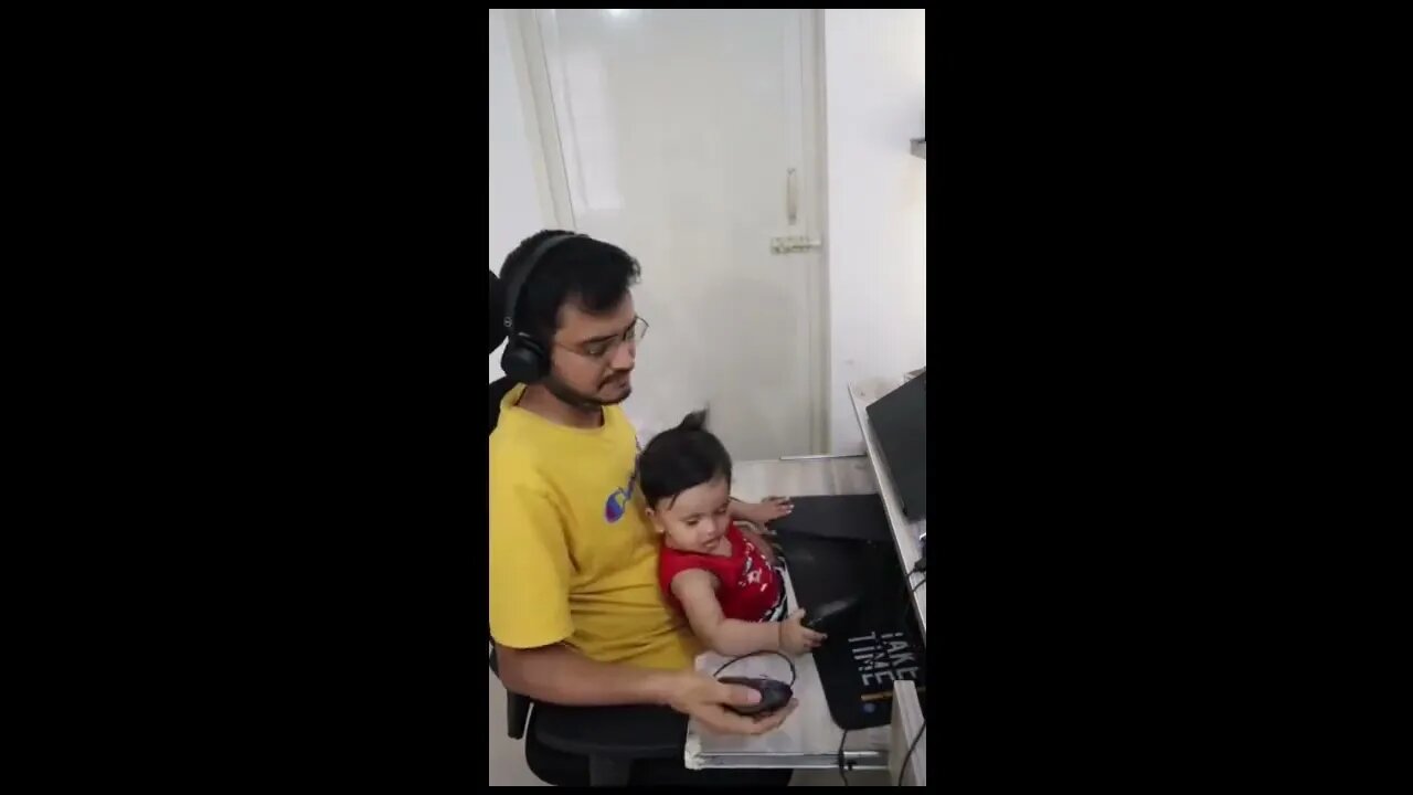 baby eats with papa