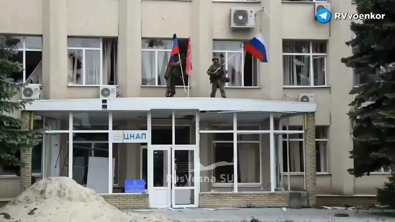 Russia and the DPR hang flags on the Liman Administration building Victory is OURS.