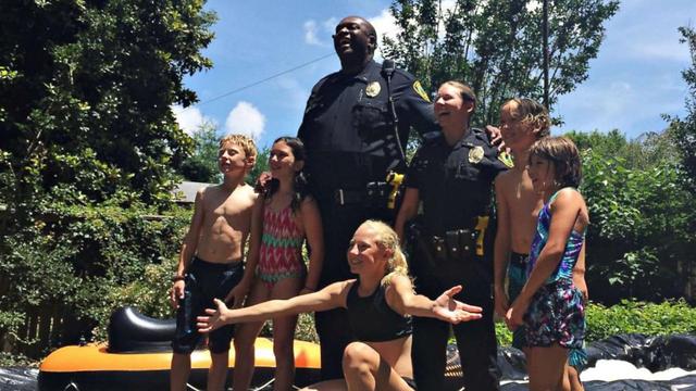 Cops Respond To Slip N' Slide Complaint, But End Up Joining In