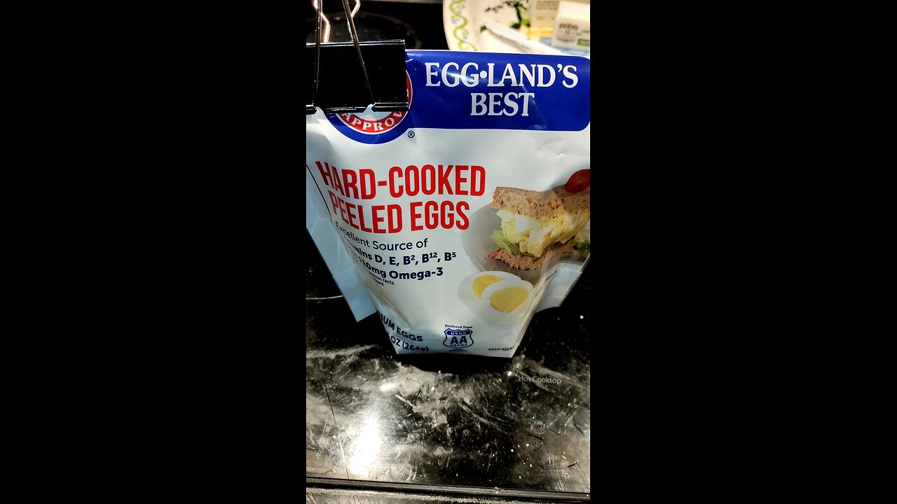 Eating Egg-Land's Best Hard-Cooked Peeled Eggs, Dbn, MI, 10/29/24