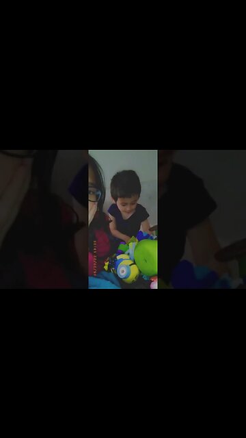 A baby girl and her baby brother smile in the camera- cuteness overload