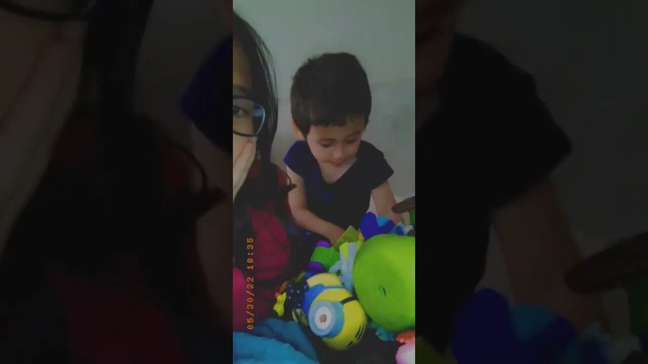 A baby girl and her baby brother smile in the camera- cuteness overload