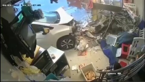 CHILD HIT BY CAR AS IT CRASHES INTO STORE !!!