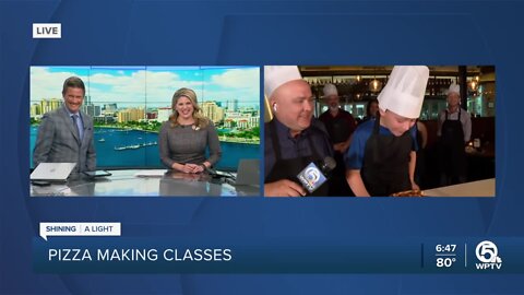 'Sweet and savory' pizza? TA Walker samples Ashleigh Walters' pie during pizza-making demonstration at Prezzo