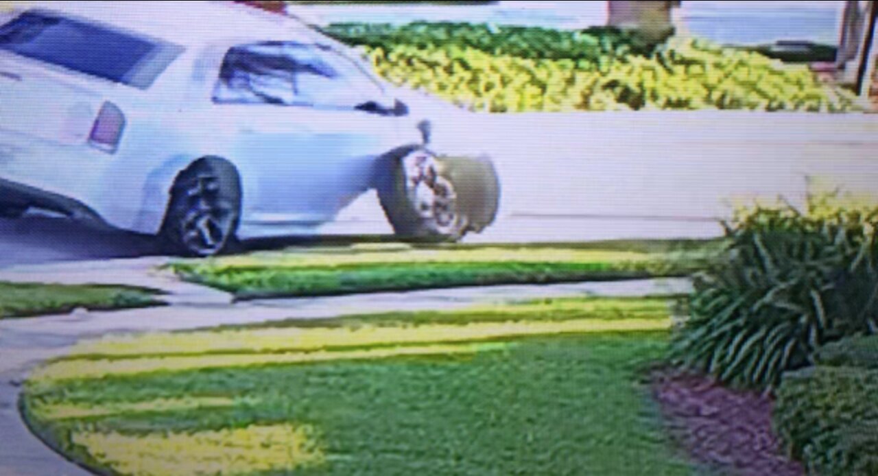 Car Crashes into Storm Drain and Rips Front Wheel Right Off!