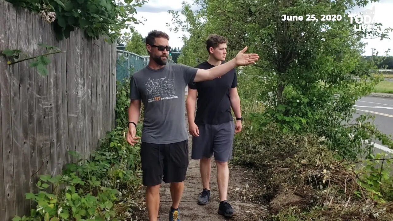 Clearing a path: Council member and son get to work