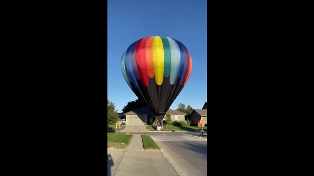 Hot air balloon lands in Omaha neighborhood (1/2)