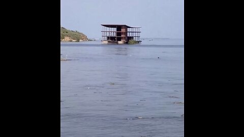 Frames of houses float by the shores of Odessa.