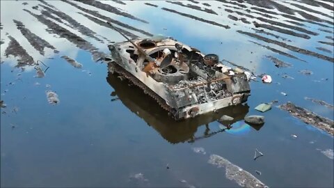 DRONE FOOTAGE OF DESTROYED/ABANDONED RUSSIAN MILITARY HARDWARE IN THE FLOODED-AREA NEAR MOSHCHUN!(1)