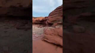 Climbing rocks to get to secret area