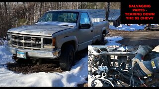 GROWING A PILE OF PARTS. Pulling parts from a 1995 Chevy truck to salvage engine and transmission.