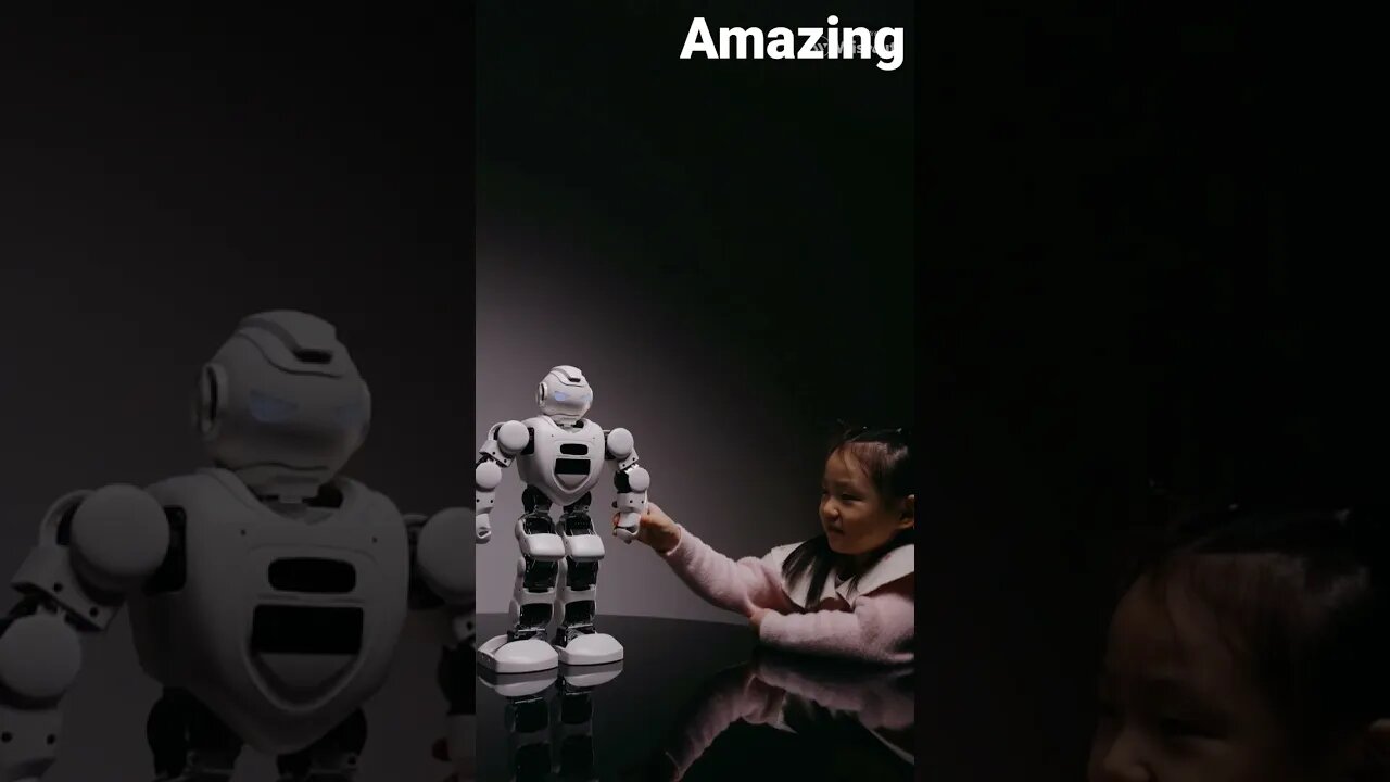 Little girl is playing with robot.