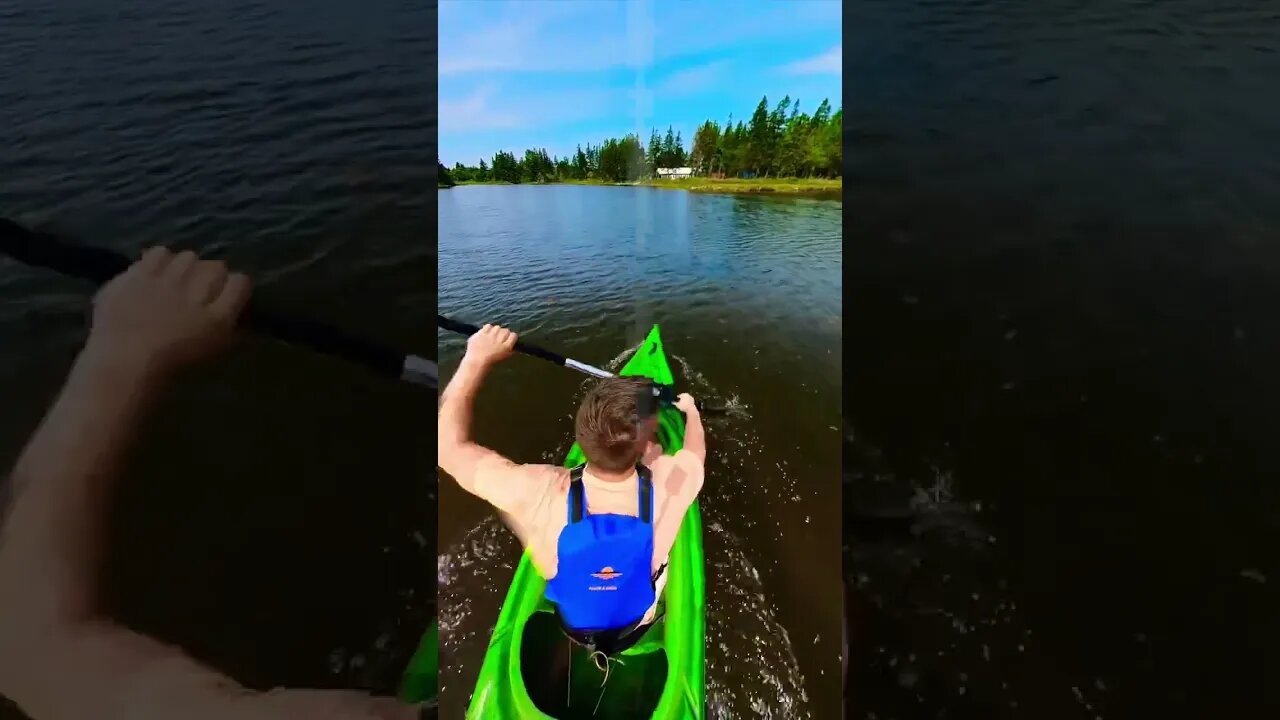 Kayaking fast through a river