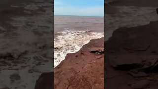 Climbing down cliffs to view the ocean