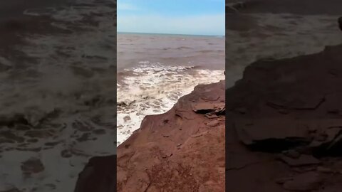 Climbing down cliffs to view the ocean