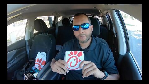 Christian Street Preacher Tries out Chick-fil-A sandwich