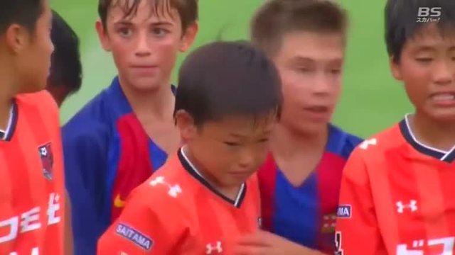 Barcelona youth soccer team consoles Japanese opponents