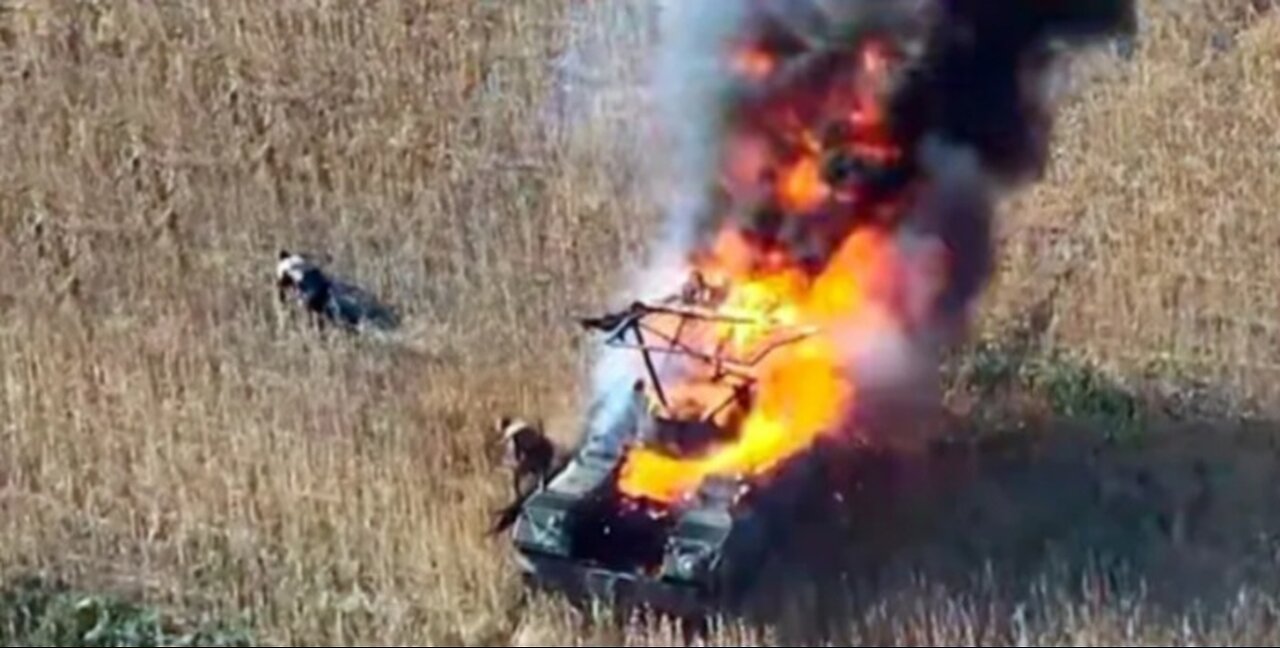 Injured Russian soldier tries to escape by crawling out of burning equipment