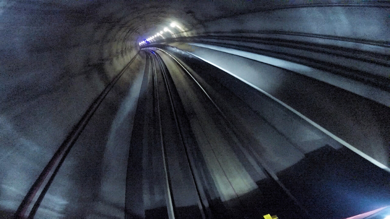 surfing on the front of a train... under a river