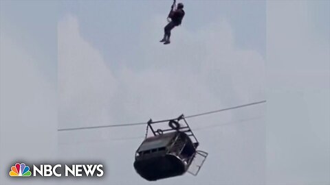 7 students and a teacher rescued from dangling cable car