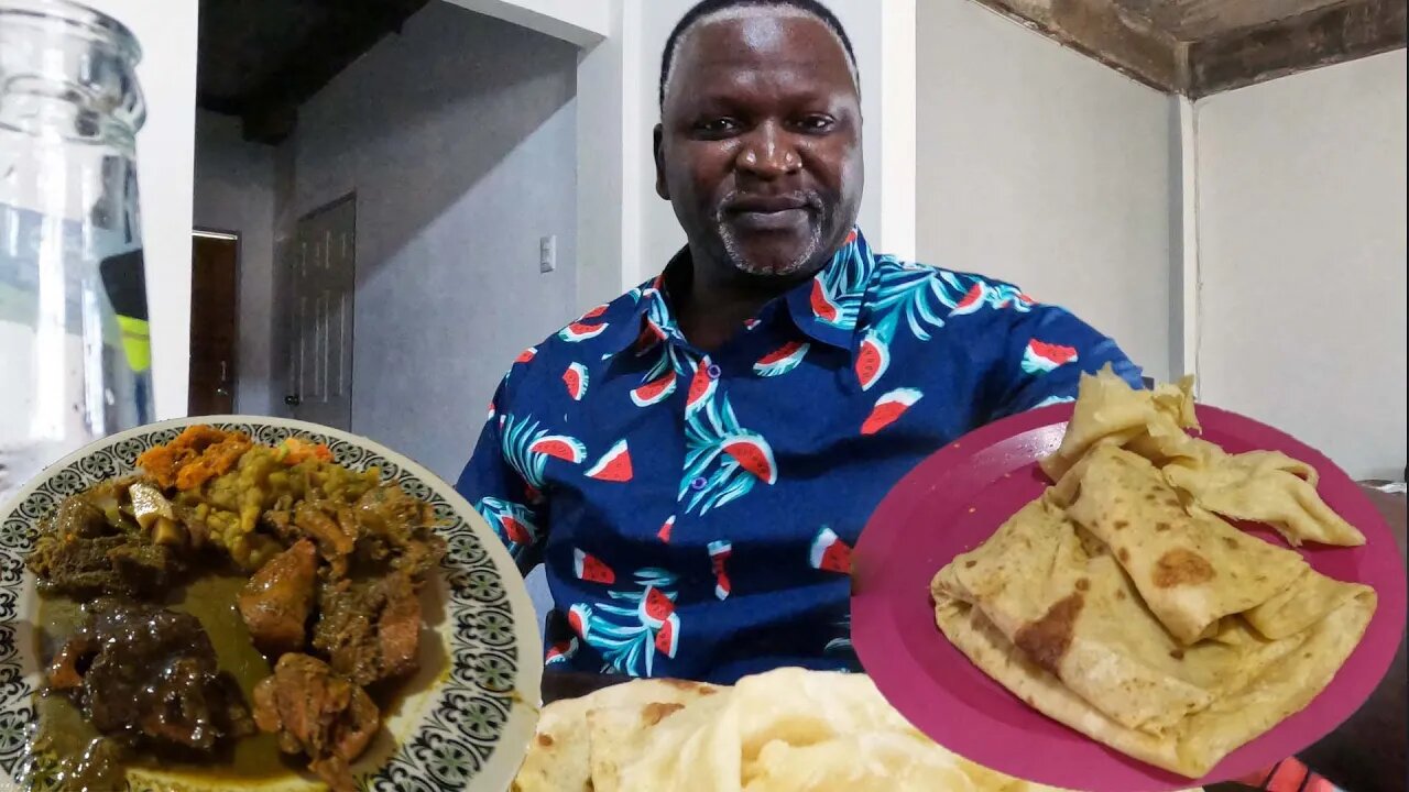 Eating Dhalpuri Roti and Buss up Shut in Trinidad