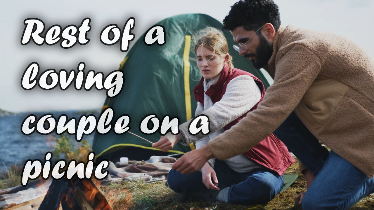 Rest of a loving couple on a picnic