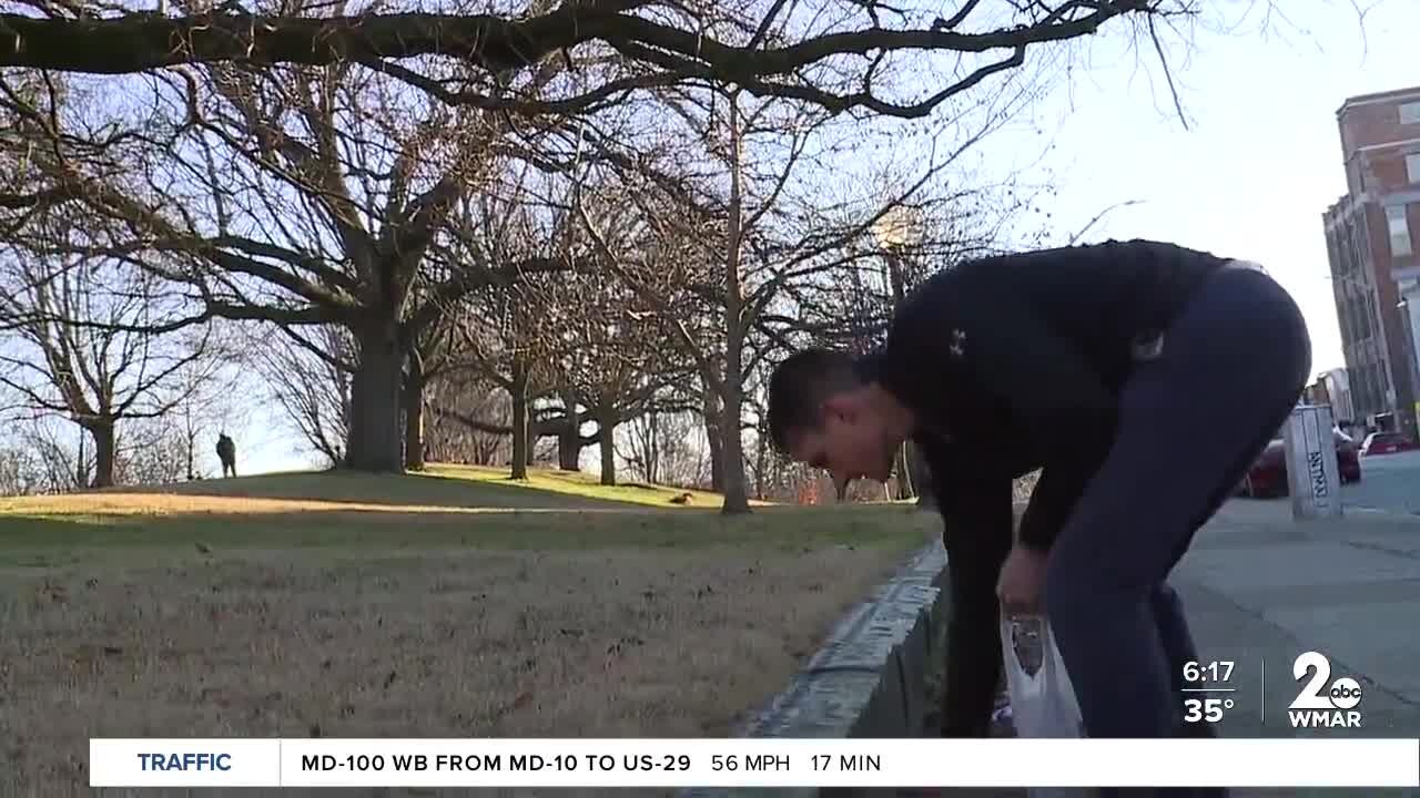 Canton man, two-year-old son bring back charm to charm city with daily cleanup
