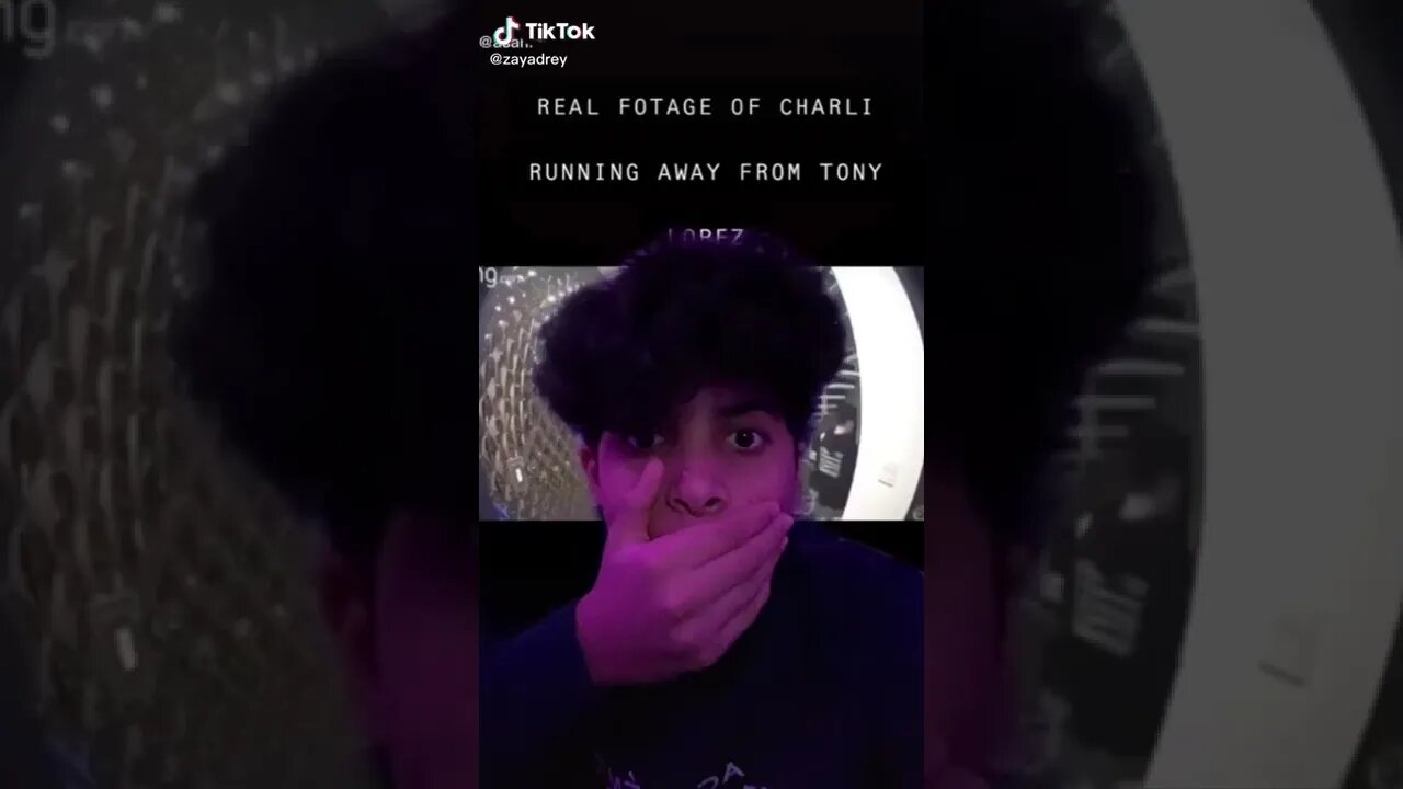 Footage of Charli Damelio running away from Tony Lopez