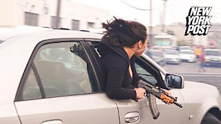 Woman seen leaning out of car holding AK-47 in San Francisco